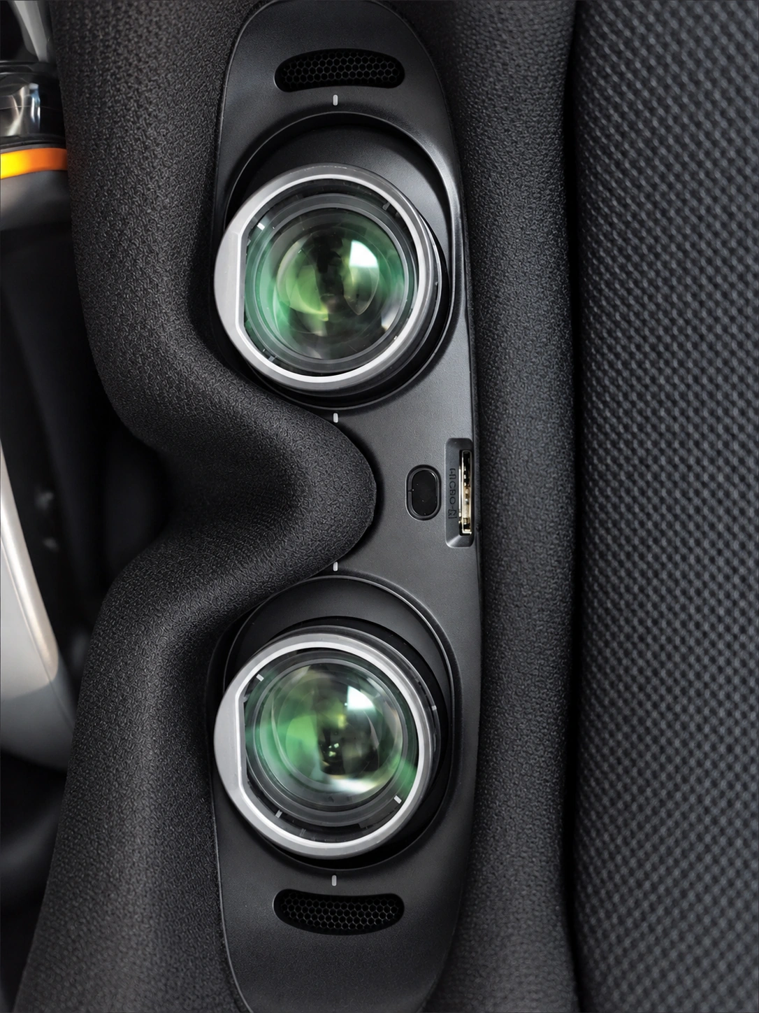 Close-up of two round eyepieces inside DJI Goggles 3