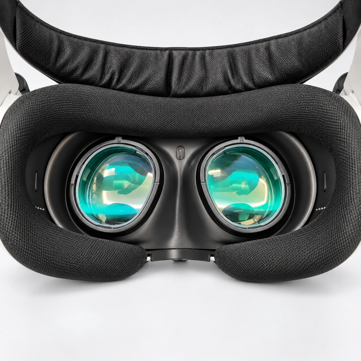 Meta Quest 3 headset interior with two green-reflective eyepieces