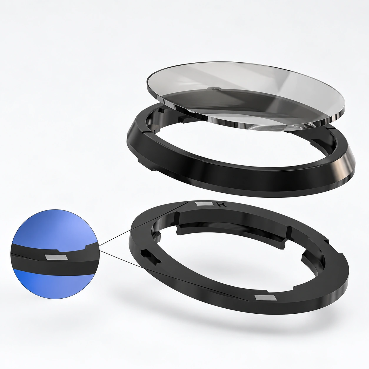 Exploded view of a clear lens and two black frame components