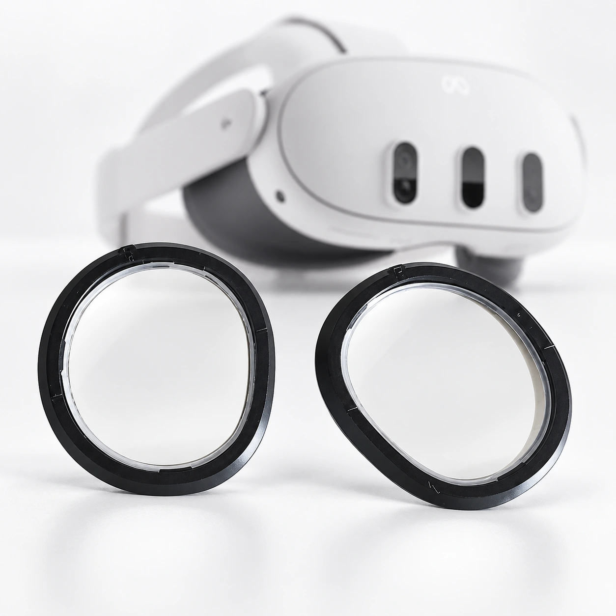 Meta Quest 3 headset with two black round lens inserts