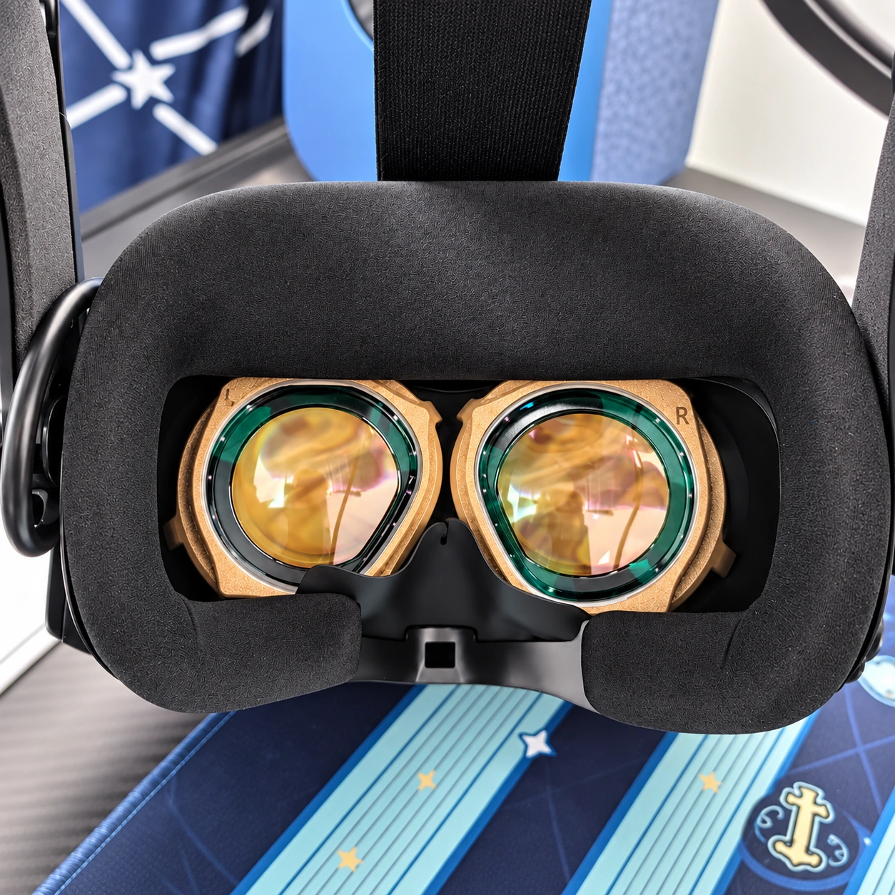 VR headset interior with two gold-rimmed eyepieces