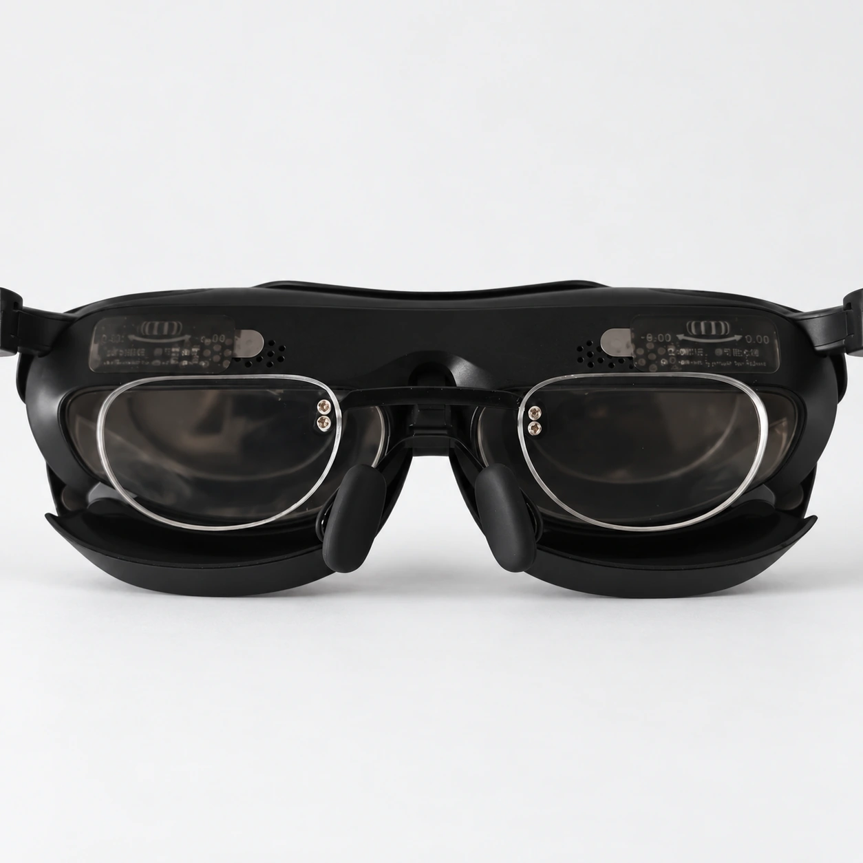 Close-up of two clear inserts inside black Rokid glasses