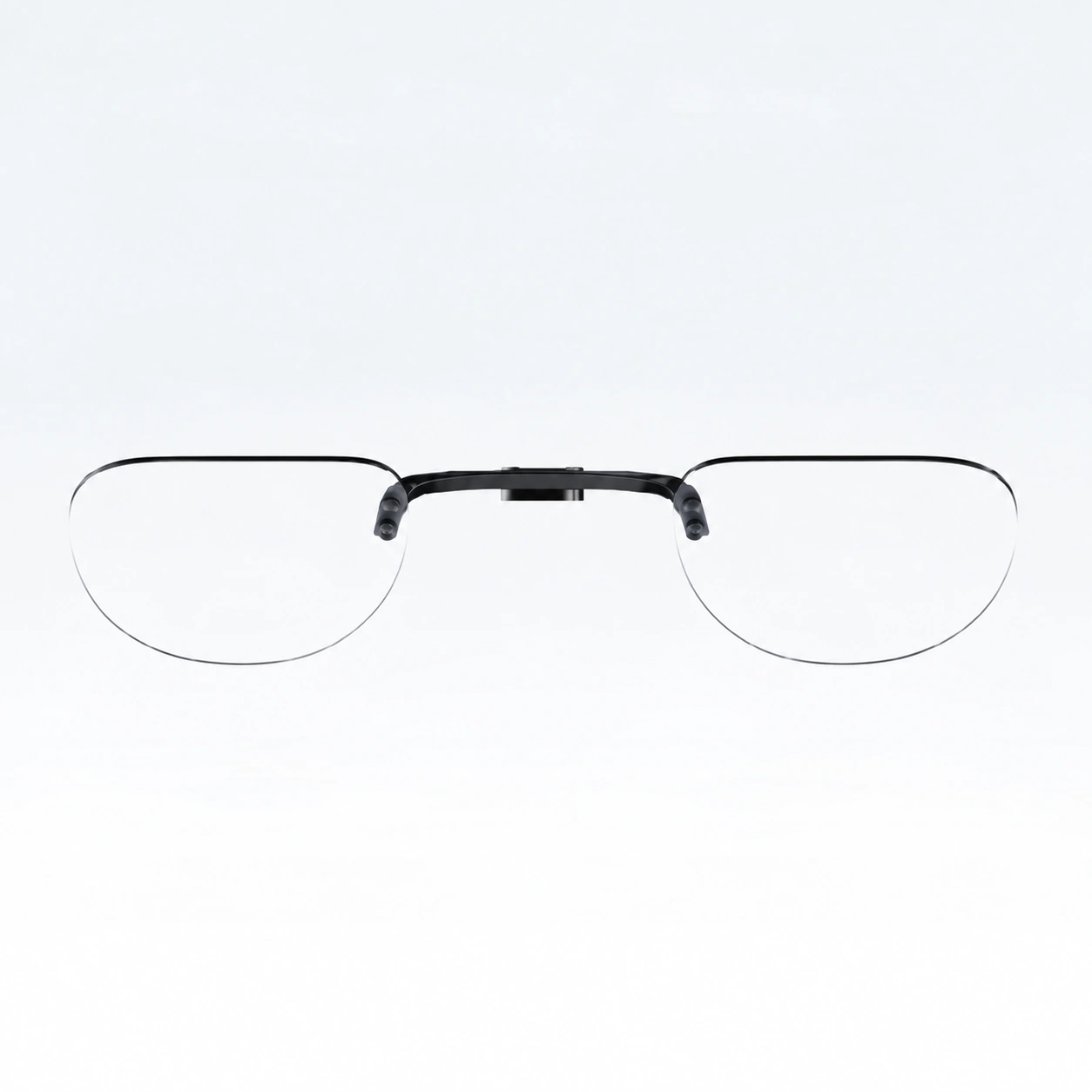 Clear two-lens insert joined by a black bridge, front view